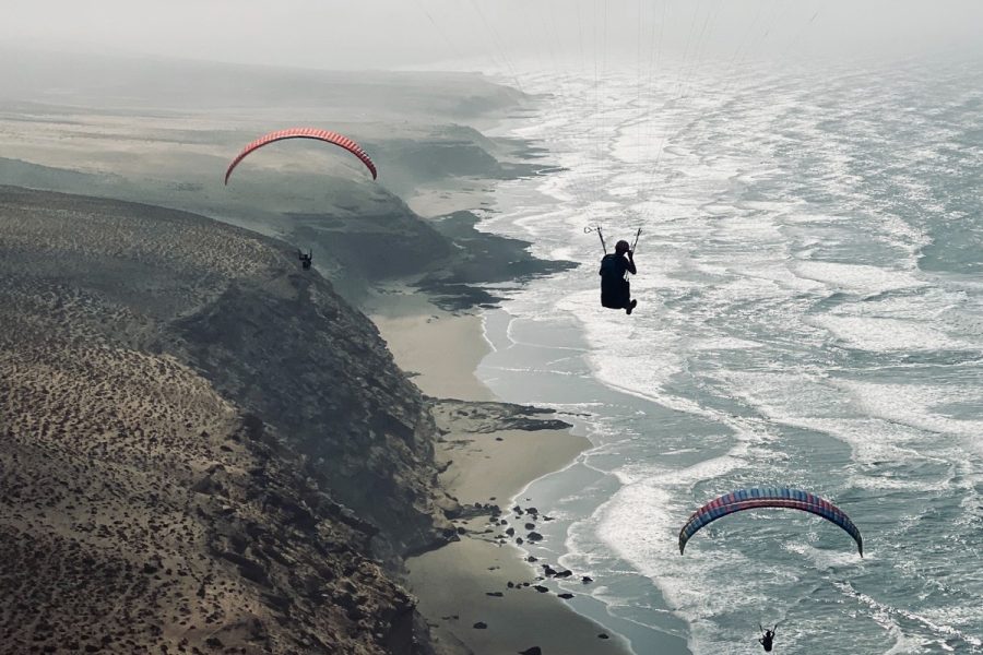 Soar Over Aglou Beach with an Paragliding Experience!